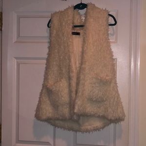 Furry sleeveless sweater with hood!